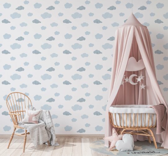 crib in nursery wallpaper with clouds