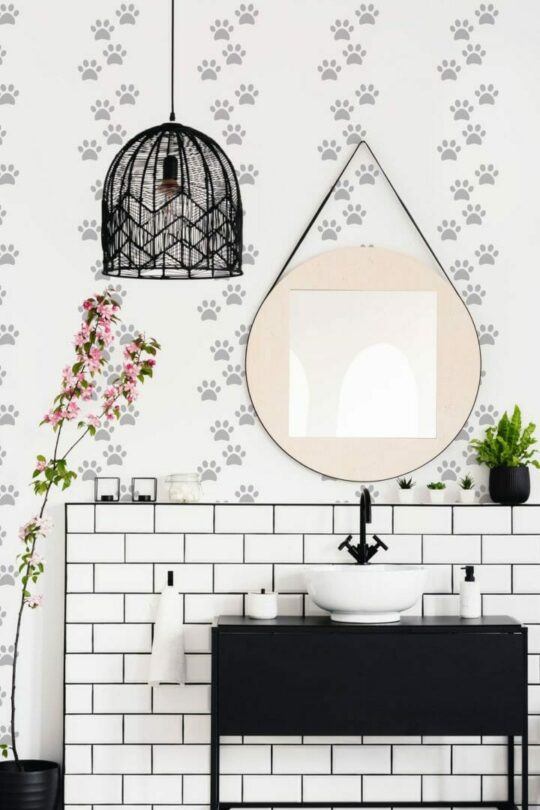 Dog paw stick on wallpaper