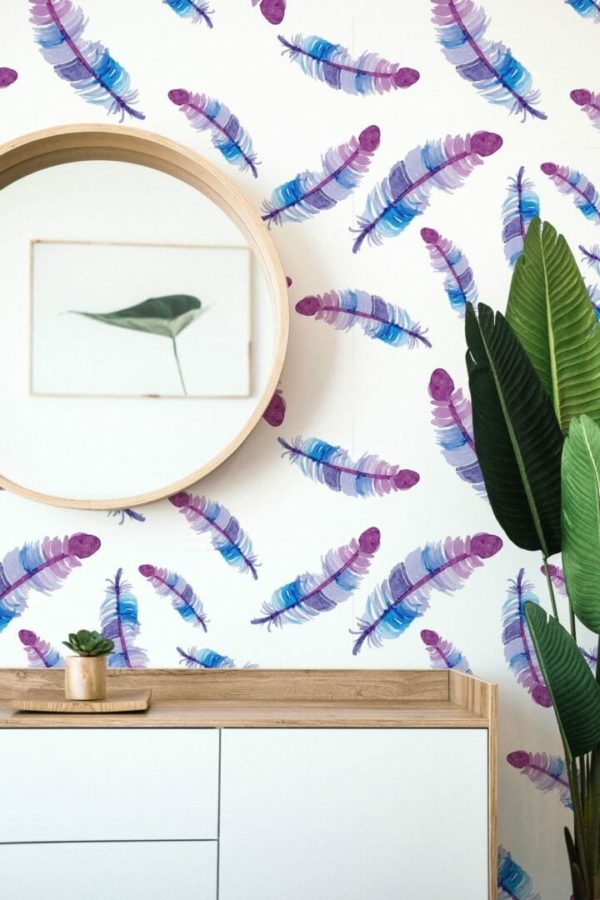 Blue and purple feather stick on wallpaper