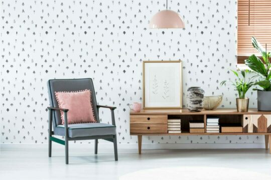 Little trees stick on wallpaper