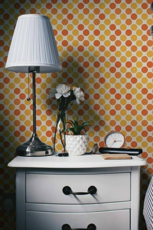Yellow and orange polka dot stick on wallpaper