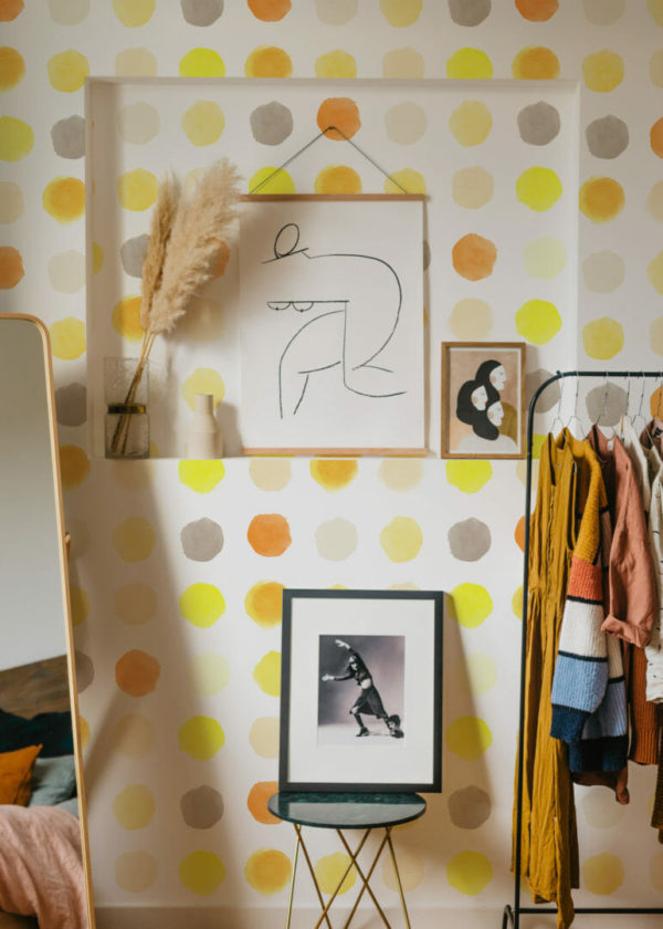 Yellow watercolor dots stick on wallpaper