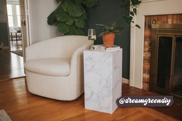 Elegant white marble wallpaper roll being unrolled, ideal for modern and stylish home decor