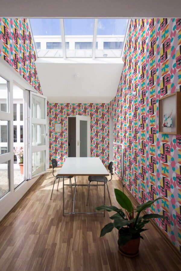 Minimal style dining room next to a balcony decorated with Abstract face peel and stick wallpaper