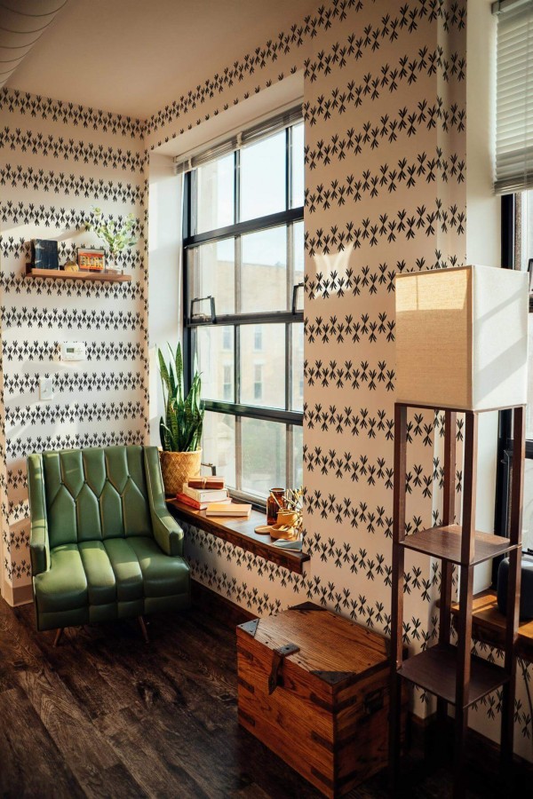 Mid-century style living room decorated with Abstract leaf stripe peel and stick wallpaper