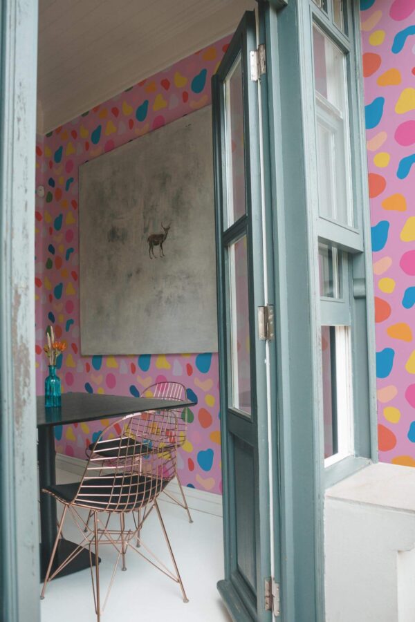 Minimal coastal style cafe decorated with Abstract shapes peel and stick wallpaper