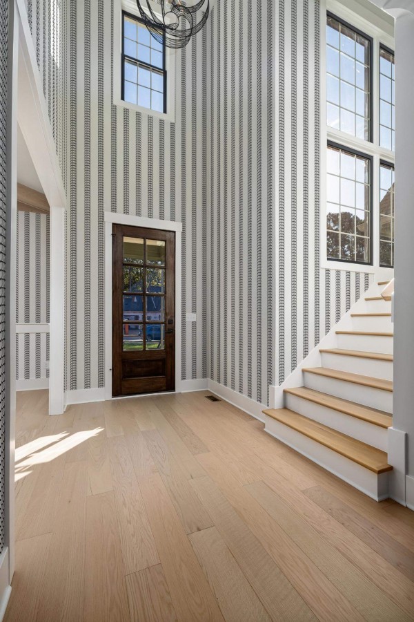 Minimal style entryway decorated with Abstract stripes peel and stick wallpaper