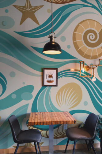 Fancy Walls green wave pattern with seashells peel and stick wall murals
