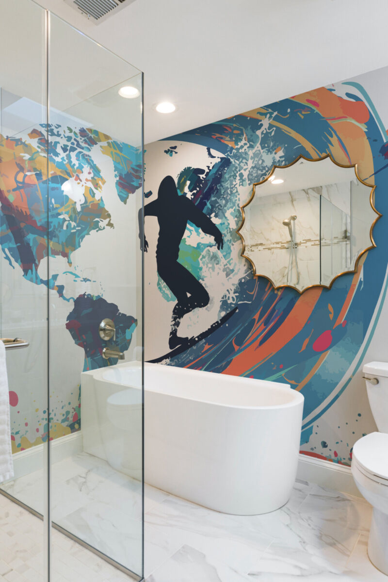 Surf World Wall Mural with a surfer silhouette on a wave and an abstract America map in blue and colorful tones, ideal for gym interiors or sporty accent walls.