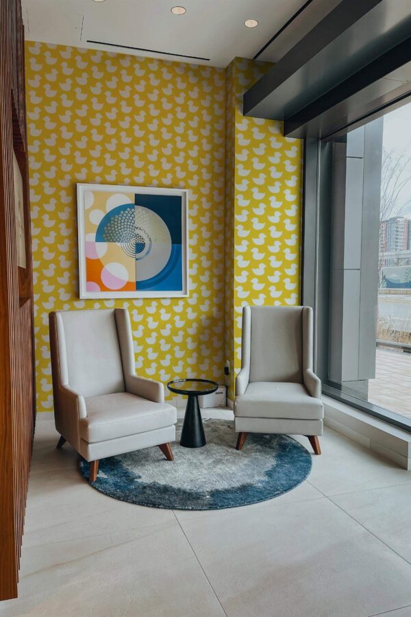 Mid-century-modern style living room decorated with Aesthetic yellow ducks peel and stick wallpaper