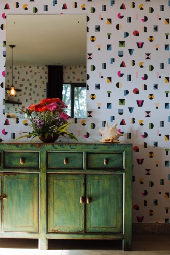 Industrial style living room decorated with Alphabet letters peel and stick wallpaper