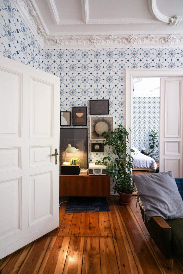 Mid-century modern luxury style living room and bedroom decorated with Antique Tile peel and stick wallpaper