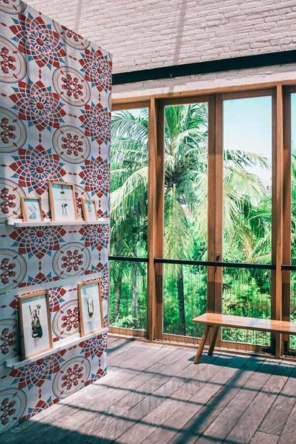 Coastal style living room decorated with Arabesque tile peel and stick wallpaper