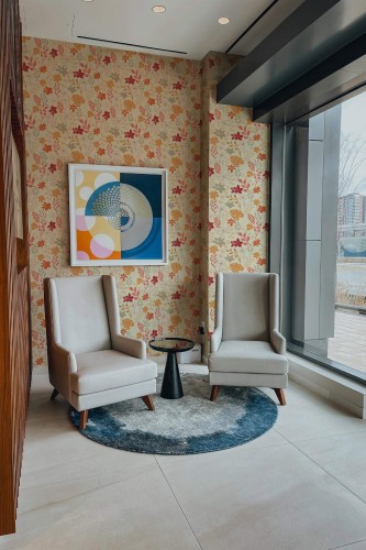 Mid-century modern style living room decorated with Autumn Botanical peel and stick wallpaper