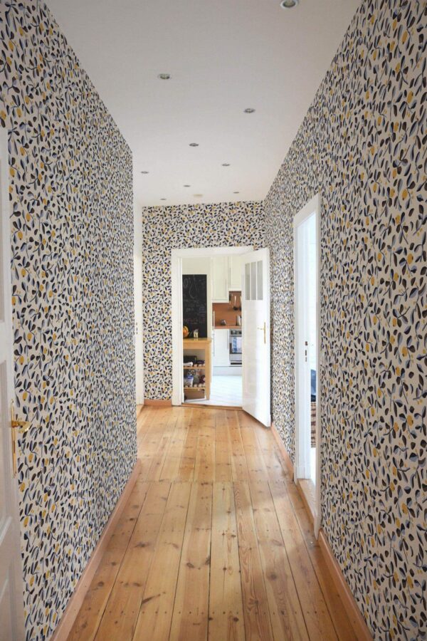 Minimal farmhouse style hallway decorated with Autumn branch peel and stick wallpaper