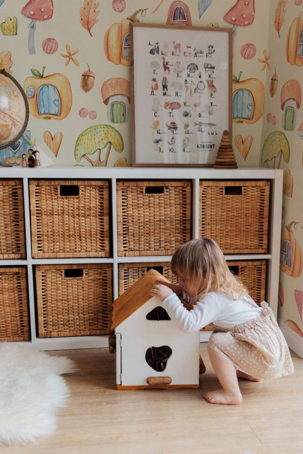 Boho gender neutral style kids room decorated with Autumn feel peel and stick wallpaper