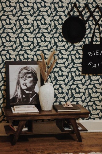 Rustic farmhouse style entryway decorated with Banana leaf peel and stick wallpaper