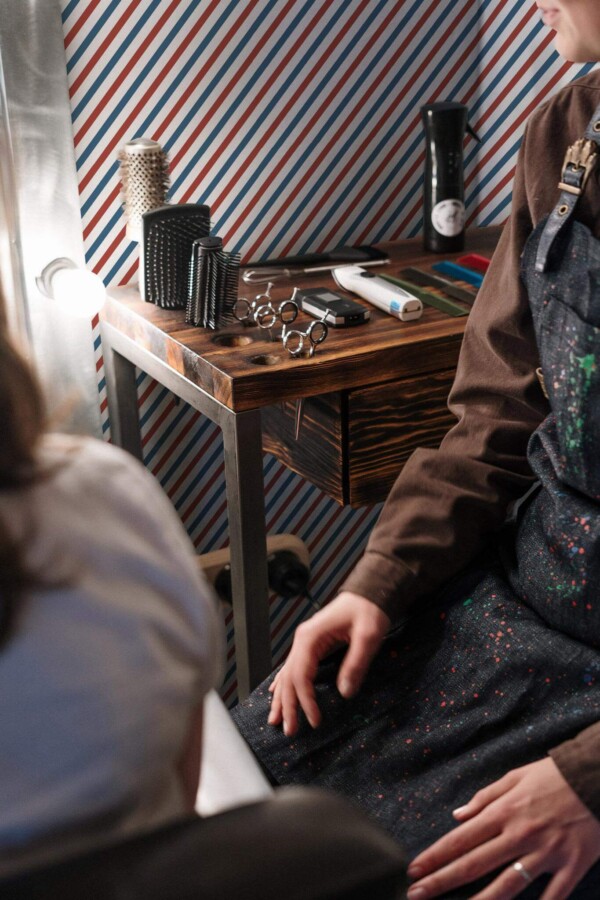 Rustic farmhouse style barber shop decorated with Barber shop stripes peel and stick wallpaper