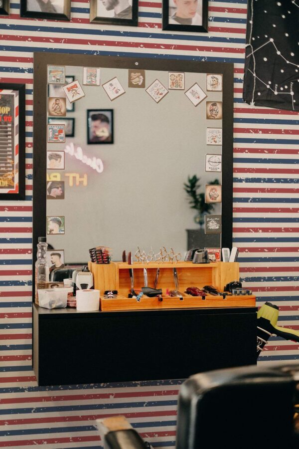 Rustic style barber shop decorated with Barber stripes peel and stick wallpaper