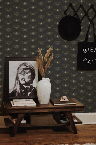 Rustic farmhouse style entryway decorated with Bee peel and stick wallpaper