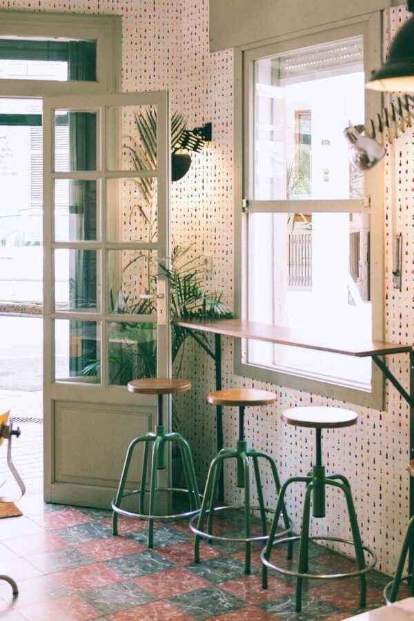Mid-century style bar decorated with Beverages peel and stick wallpaper