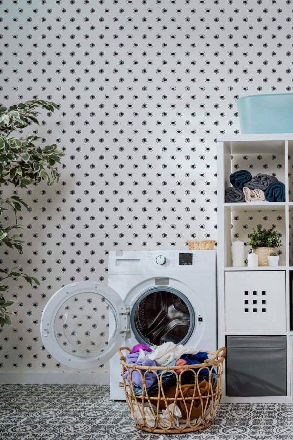 Minimal scandinavian style laundry room decorated with Black and white eye peel and stick wallpaper