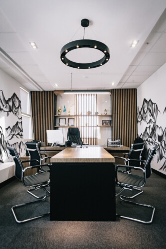 Monochrome Mountain Wall Mural with hand-drawn black and white mountain line art, perfect for office walls, creative studios, or modern accent spaces.