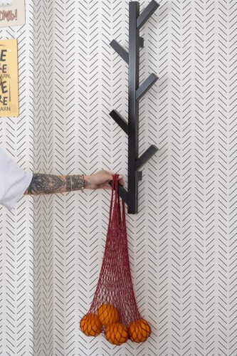 Scandinavian style kitchen decorated with Black and white herringbone peel and stick wallpaper