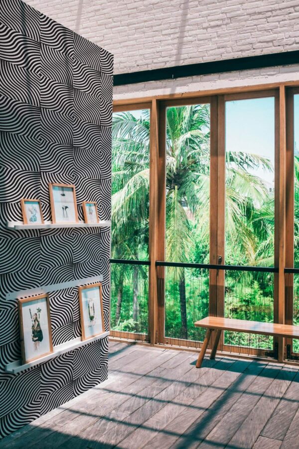 Coastal style living room decorated with Black and white Op Art peel and stick wallpaper