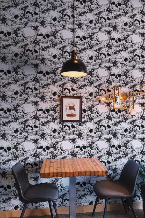 Rustic farmhouse style dining room decorated with Black and white skull peel and stick wallpaper