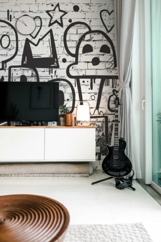 Peel and stick wall mural by Fancy Walls with a black and white graffiti design