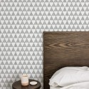 Farmhouse style bedroom decorated with Black triangles peel and stick wallpaper