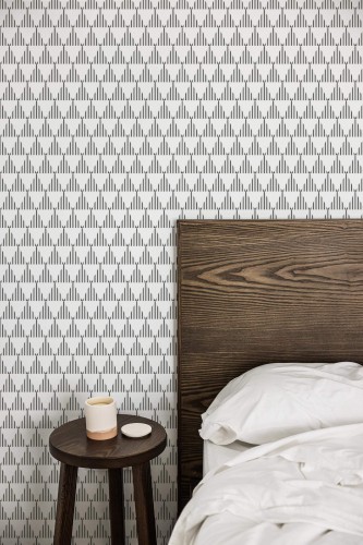 Farmhouse style bedroom decorated with Black triangles peel and stick wallpaper