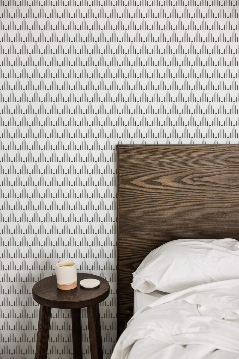 Farmhouse style bedroom decorated with Black triangles peel and stick wallpaper