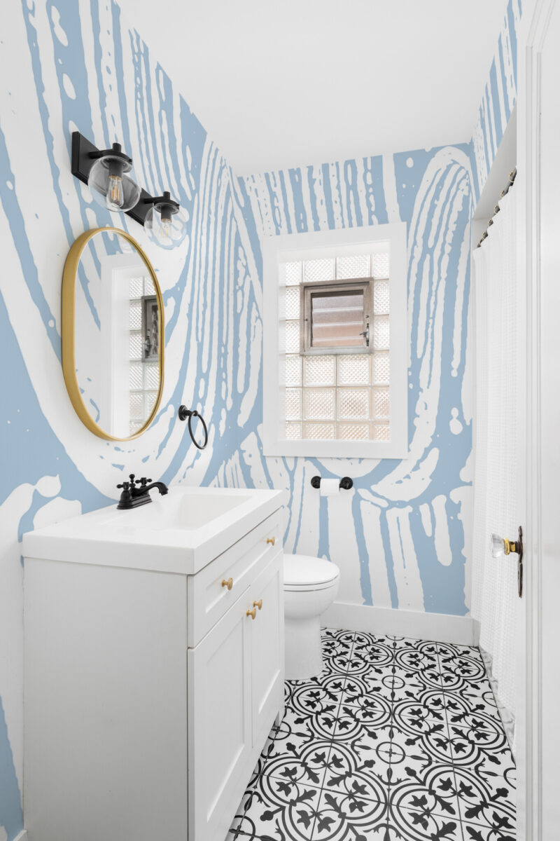 Tranquil Trees Wall Mural with abstract blue and white brushstrokes resembling soap textures, perfect for bathrooms, spa-like interiors, or artistic accent walls.