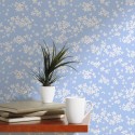 Scandinavian style accent wall decorated with Blue and white daisy peel and stick wallpaper