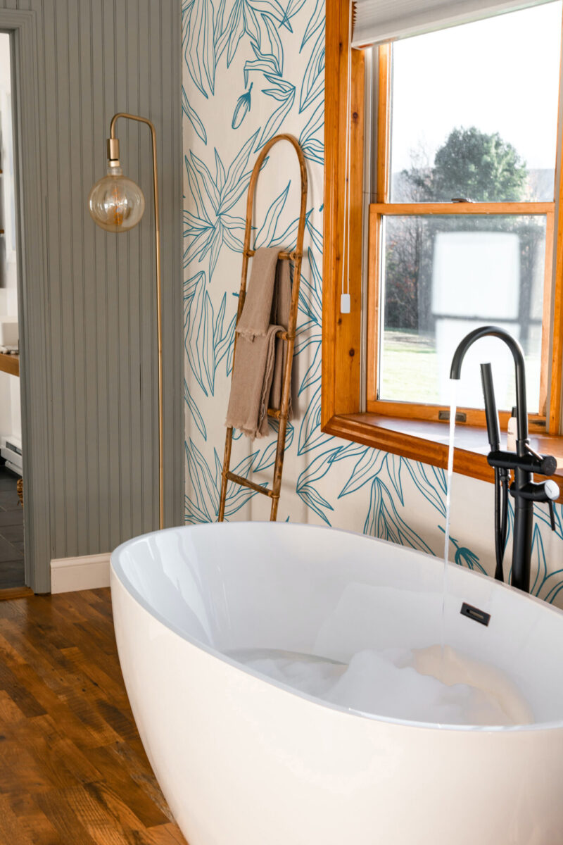 Leaf Lines Wall Mural with simple blue leaf line patterns on a white background, perfect for bathrooms, vanity spaces, or clean modern accent walls.