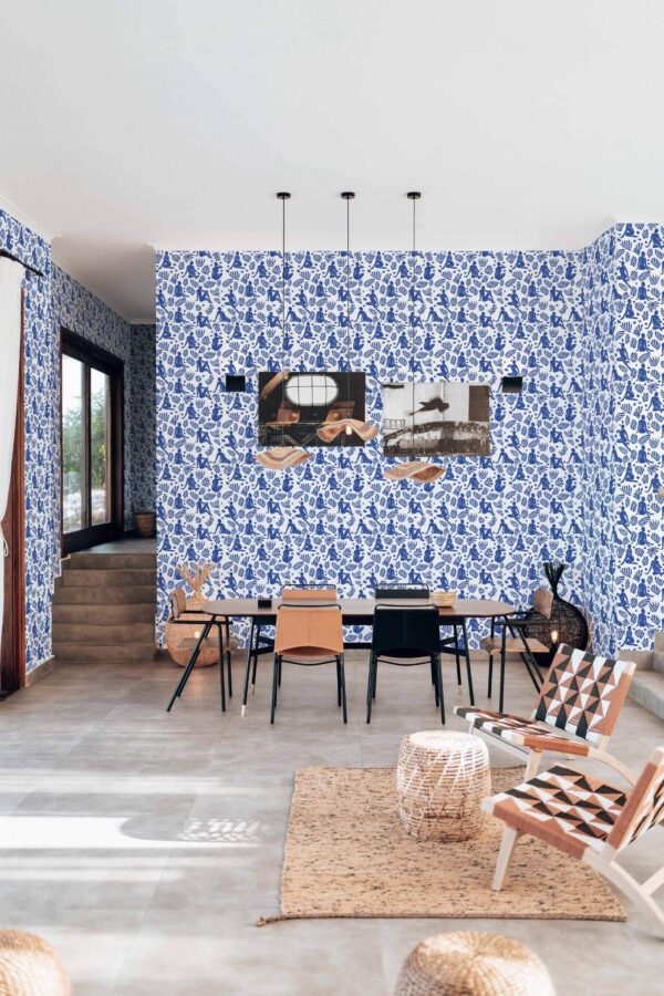 Modern boho style living dining room decorated with Blue and white Matisse peel and stick wallpaper