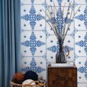 Coastal style living room decorated with Blue and white tiles peel and stick wallpaper
