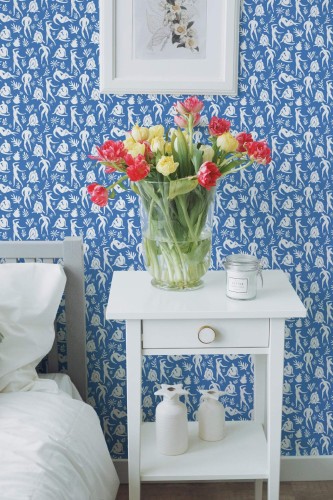 Farmhouse style bedroom decorated with Blue body shape peel and stick wallpaper