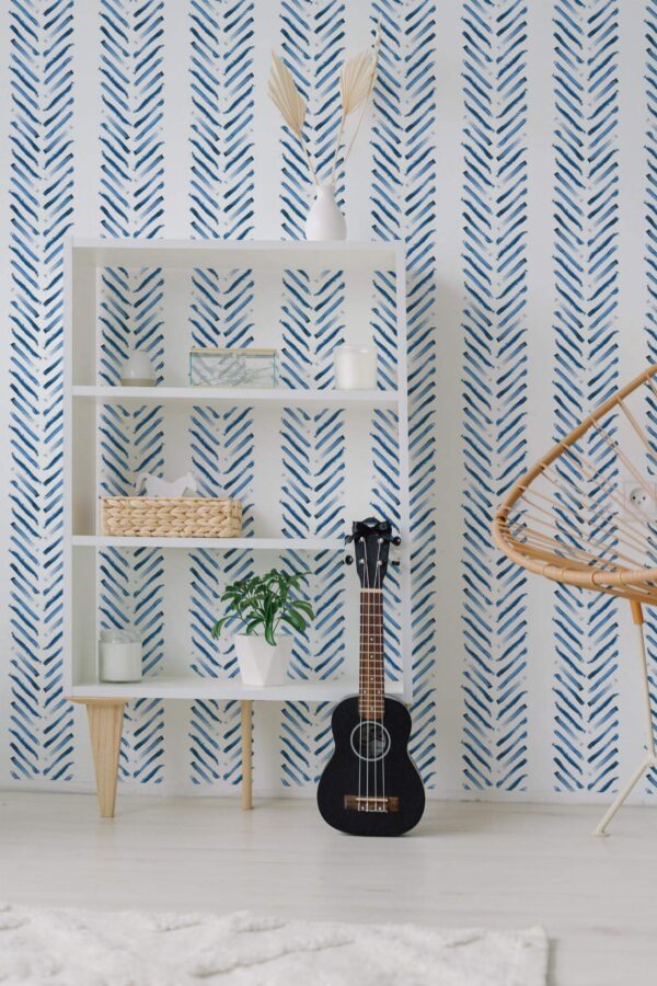 Minimal boho style living room decorated with Blue brush herringbone peel and stick wallpaper