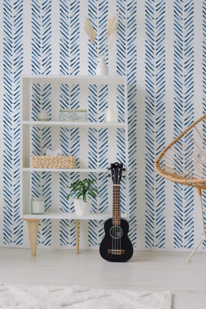 Minimal boho style living room decorated with Blue brush herringbone peel and stick wallpaper