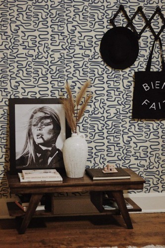 Rustic farmhouse style entryway decorated with Blue Brush stroke peel and stick wallpaper