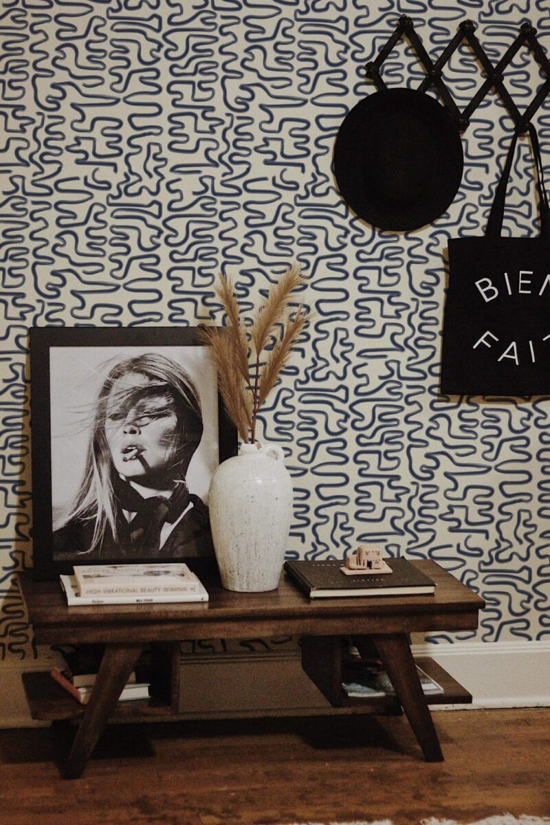 Rustic farmhouse style entryway decorated with Blue Brush stroke peel and stick wallpaper