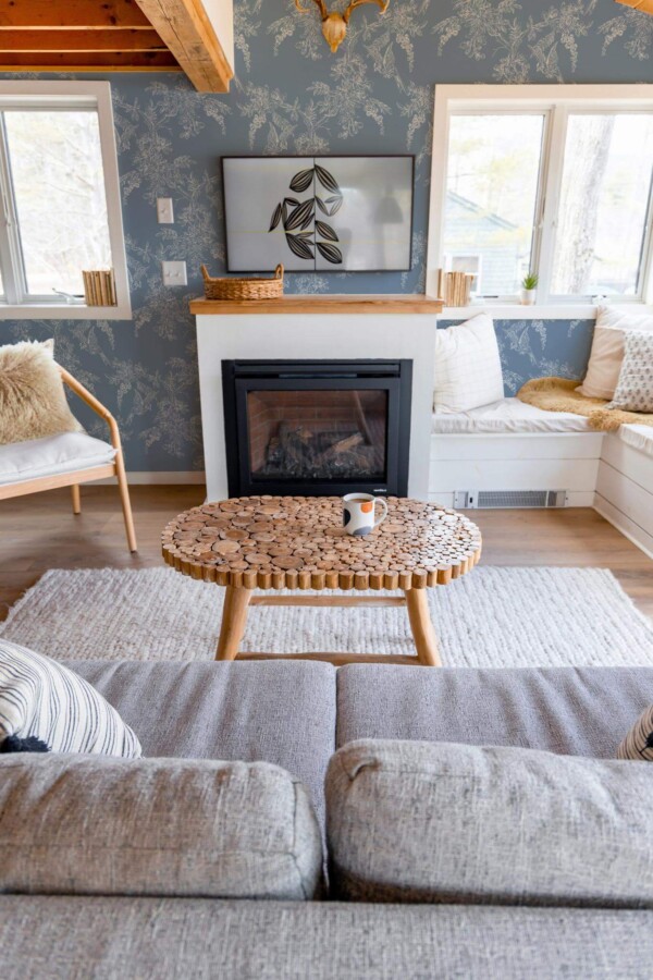 Farmhouse boho style living room decorated with Blue cherry blossom peel and stick wallpaper