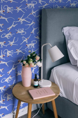 Rustic style bedroom decorated with Blue monkey peel and stick wallpaper