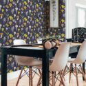 Dining room featuring Blue Aesthetic Mushrooms wallpaper with a whimsical, purple-patterned design showcasing delicately illustrated mushrooms. The space features a sleek black table, modern white chairs, and natural wood flooring, while a subtle feather print on the wall adds an extra touch of nature-inspired elegance and style
