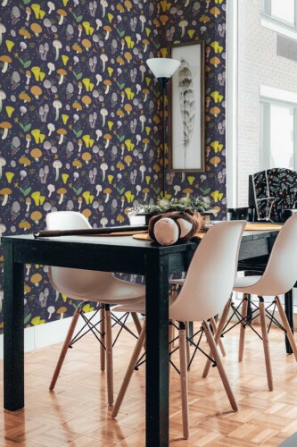 Dining room featuring Blue Aesthetic Mushrooms wallpaper with a whimsical, purple-patterned design showcasing delicately illustrated mushrooms. The space features a sleek black table, modern white chairs, and natural wood flooring, while a subtle feather print on the wall adds an extra touch of nature-inspired elegance and style