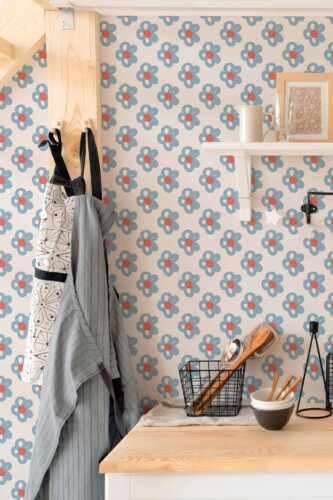 Fancy Walls peel and stick wallpaper with abstract retro floral pattern in blue and orange.