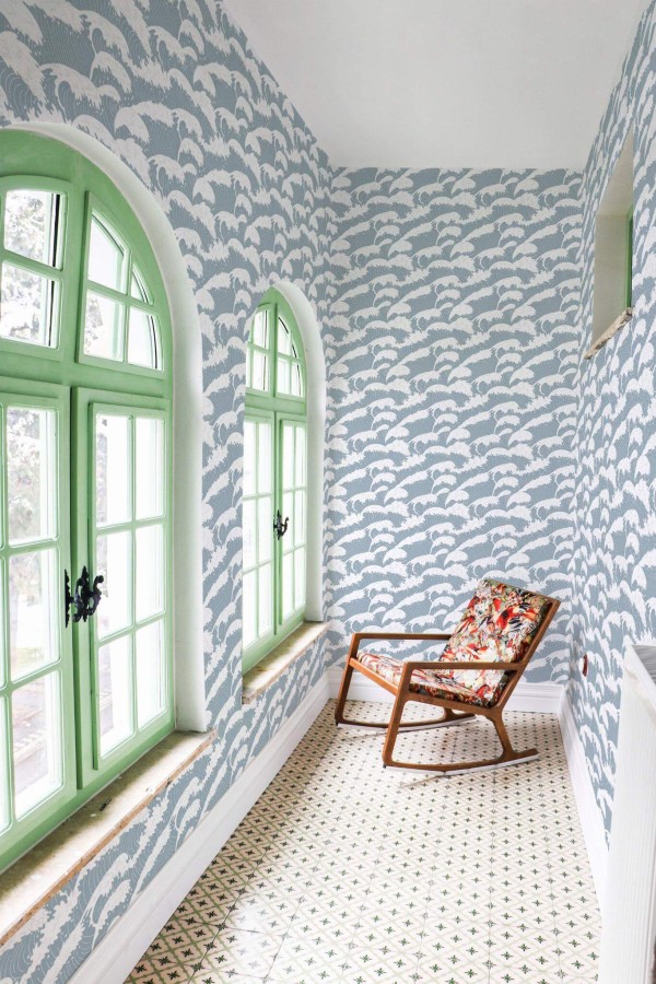 Mediterranean style hallway decorated with Blue wave peel and stick wallpaper
